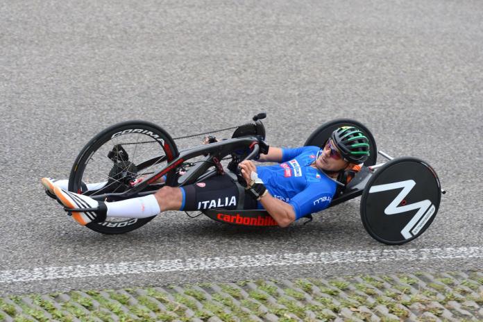 Italian Para cyclist Fabrizio Cornegliani competes in a handcycle.