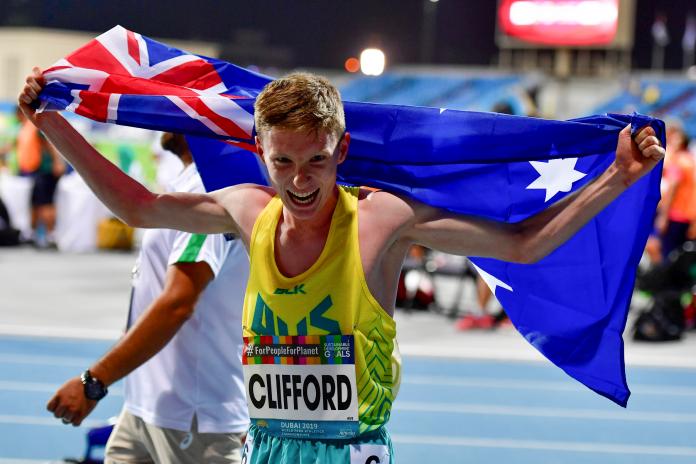 Jaryd Clifford  celebrates with Australian flag