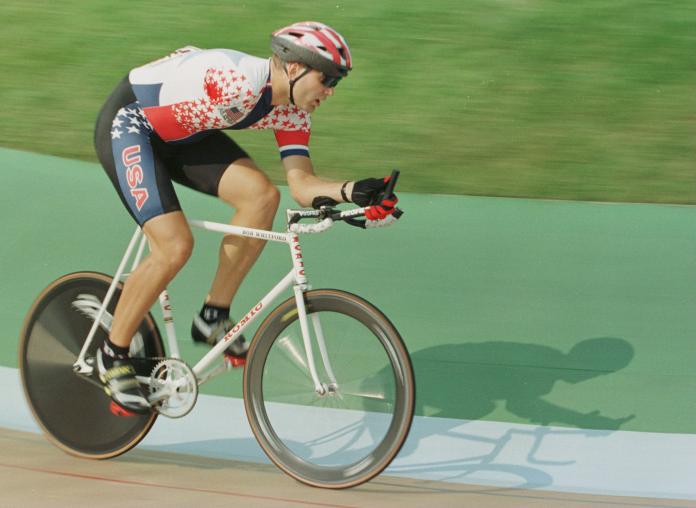 US cyclist with one arm competing on the track during the Atlanta 1996 Paralympics