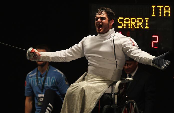 British wheelchair fencer ​​​​​​​Dimitri Coutya screams in joy with his arms wide open