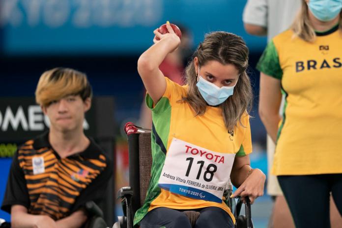 A female boccia athlete is preparing to throw a boccia ball at the Tokyo 2020 Paralympics.