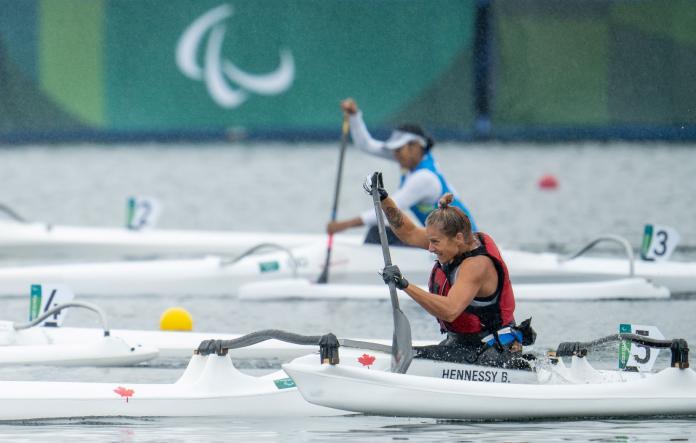 A female Para canoe athlete competes at Tokyo 2020.