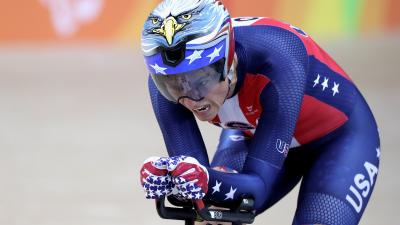 female Para cyclist Shawn Morelli rides towards the finish line on her bike