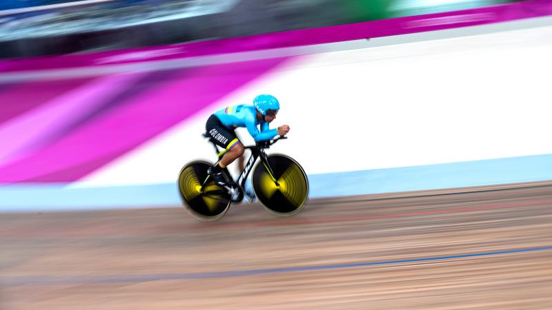 a male Para cyclist on the track