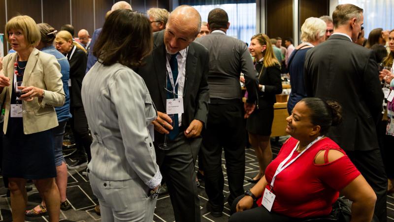 People mingle during VISTA 2019 conference