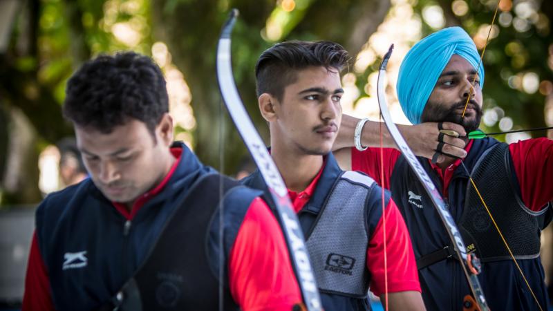 Three archers from India compete as a team