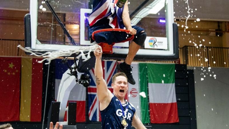 Great Britain players celebrate the Wheelchair Basketball World Championships title in Hamburg
