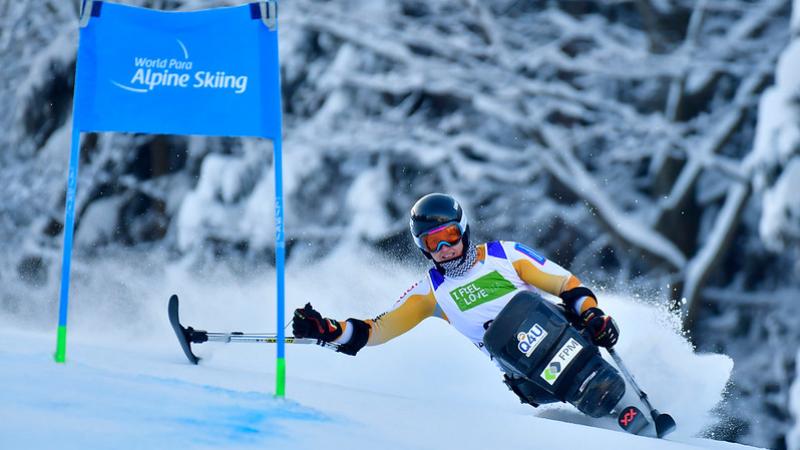 A female sit-skier competing 