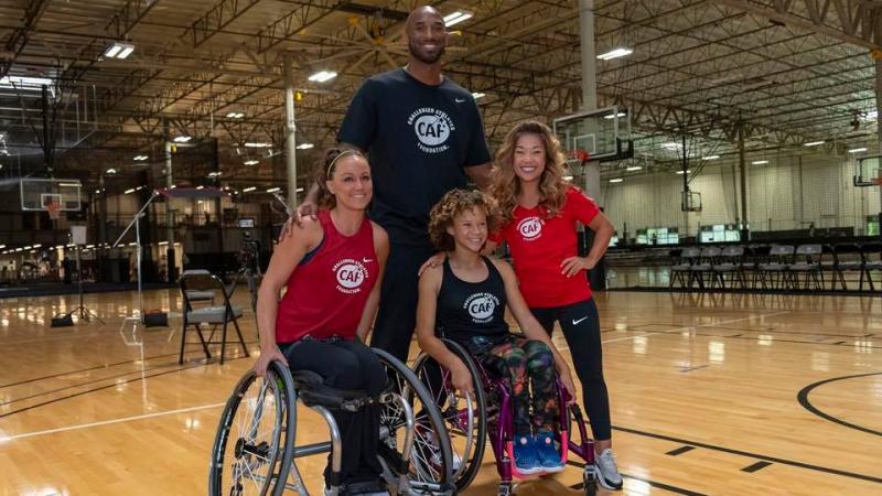 NBA star Kobe Bryant with three Para athletes