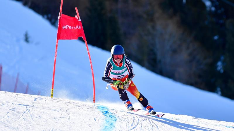Female skier rides down the course