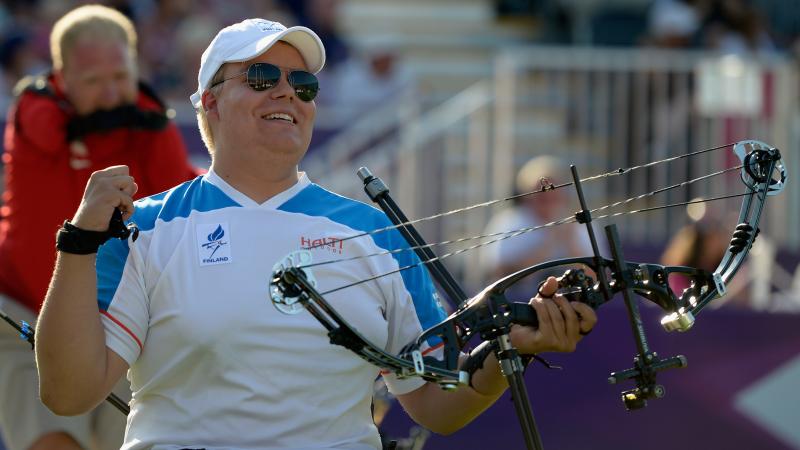 Finnish male archer celebrates after winning Paralympic gold