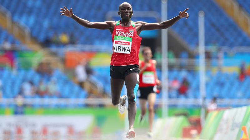 Photo of Kenya runner celebrating after crossing the finish line