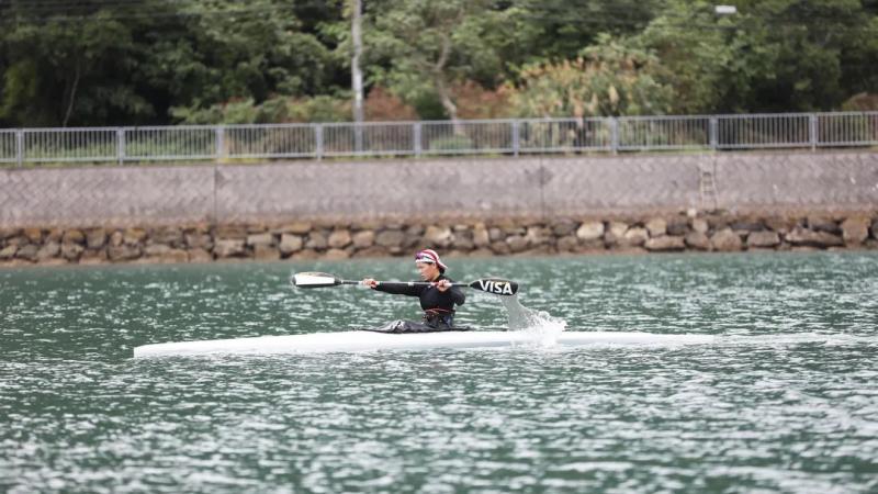 Japanese female canoeist on her kayak