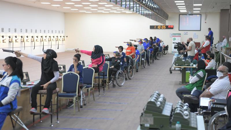  Sareh Javanmardi competing in the pistol event at the Al Ain World Cup 2021 alongside 12 other athletes 