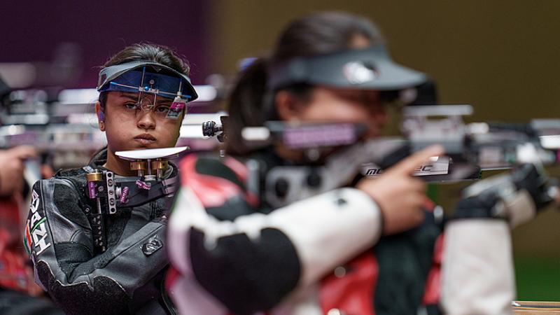 India female shooting athlete on the range