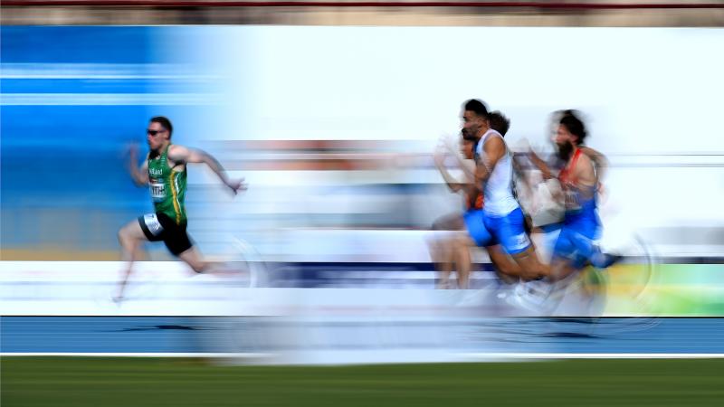A man ahead of his competitors in an athletics race