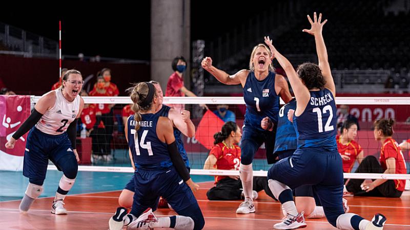 US female sitting volleyball team celebrates winning gold against China