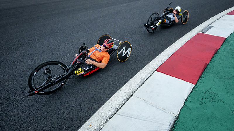 Two female handcyclists racing