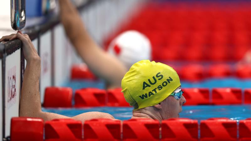 A female Para swimmer with an Australian swimming cap