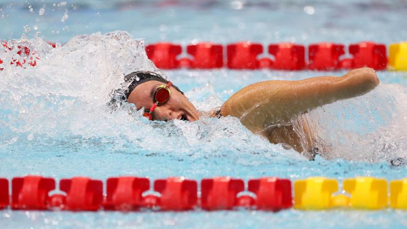 A female swimmer in a competition