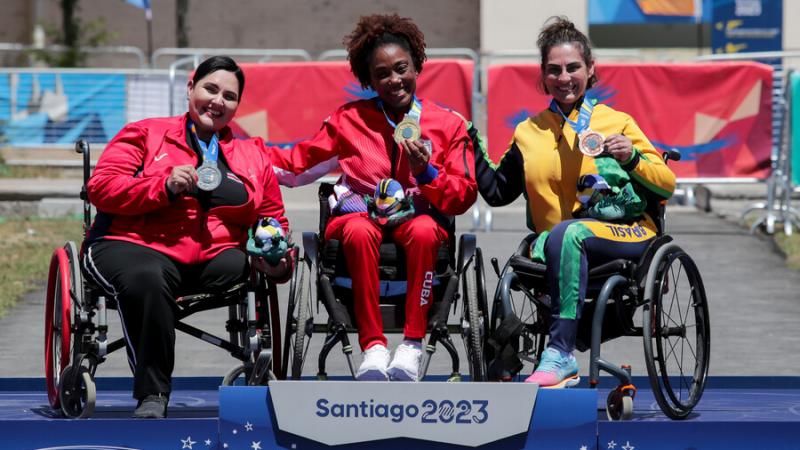 Three women on a podium at the Santiago 2023 Parapan American Games