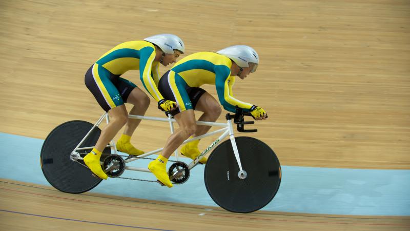 A picture of 2 men cycling