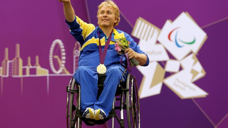 Jonas Jakobsson of Sweden poses with his gold medal