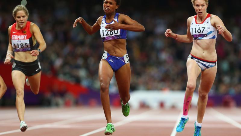 A picture of women running on a track