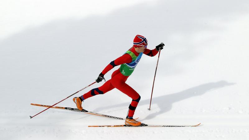 A picture of a man on a cross country skiing