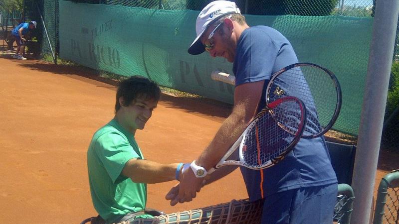Gustavo Fernandez works with coaches at a ITF  workshop in Turkey
