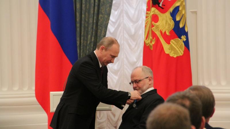Vladimir Putin and Sir Philip Craven