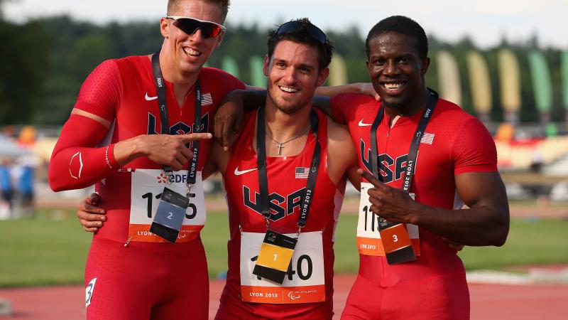 Three members of USA's athletics team - Jarryd Wallace, David Prince and Jerome Singleton - pose for a photo.