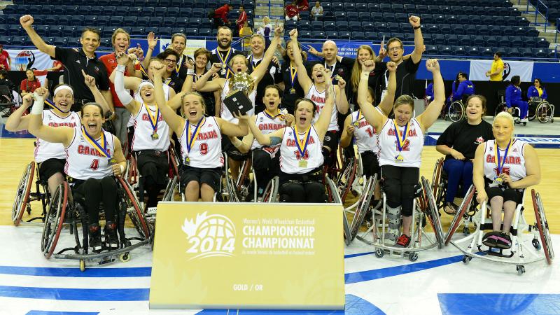 Team Canada celebrates their victory over Team Germany in the gold medal game at the 2014 Women's World Wheelchair Basketball Championships in Toronto, Canada.