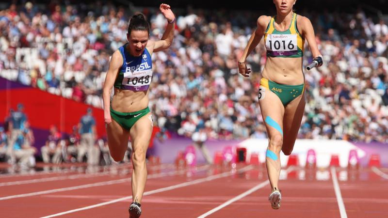 Sheila Finder, Brazil, and Carlie Beattie, Australia, in the women's 100m T46 heat at the London 2012 Paralympic Games.