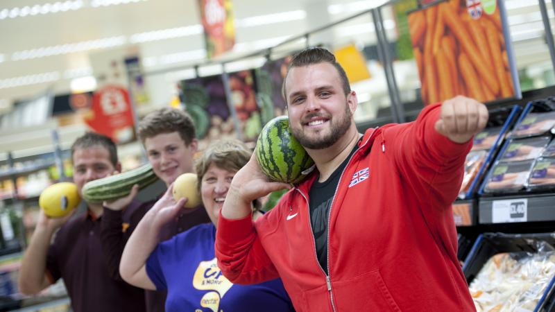 Aled Sion Davies, Nathan Stephens and Kryon Duke at local supermarket in Swansea