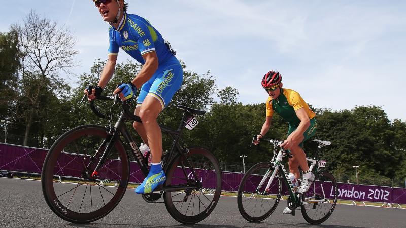Australian cyclist behind Italian cyclist
