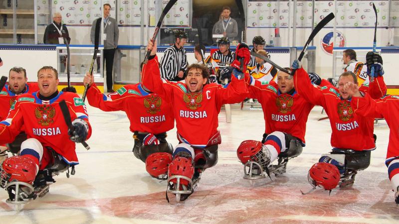 Russian captain Dmitrii Lisov celebrates with his teammates after defeating Germany at Buffalo 2015.