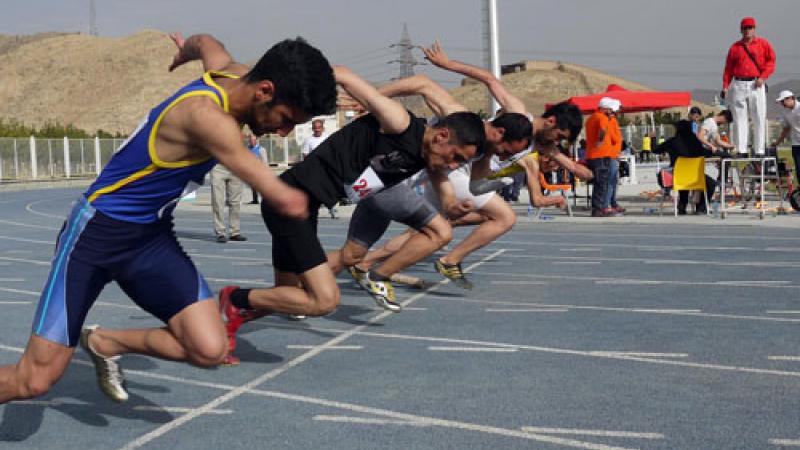 Iran athletes take off during a race in the Iran National Para-Athletics Championships.