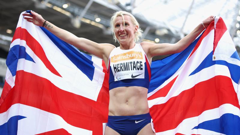 Georgina Hermitage of Great Britain celebrates winning the Women's 400m T37 race and breaking the world record at the 2015 IPC Athletics Grand Prix Final.