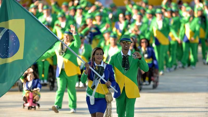 Brazilian sprinter Terezinha Guilhermina carrying the Brazilian flag during the Toronto 2015 Opening Ceremony