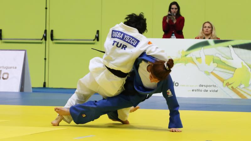 Two judokas competing at the European judo championships