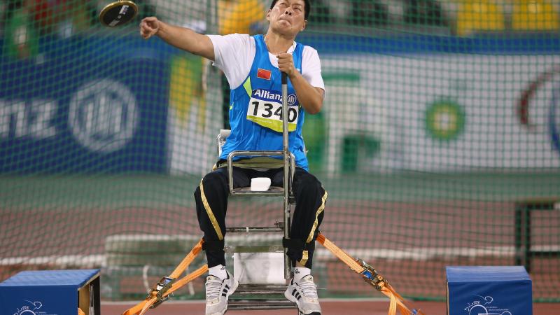Chian's Liwan Yang competes in the women's discus F55 final during the 2015 IPC Athletics World Championships in Doha, Qatar.