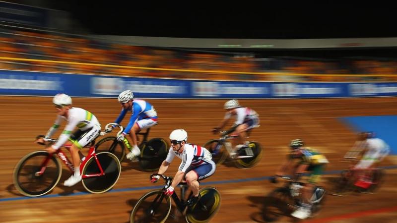 A group of cyclists compete in the Men's C4-5 Scratch race at the UCI Para-cycling Track World Championships in Apeldoorn, Netherlands.