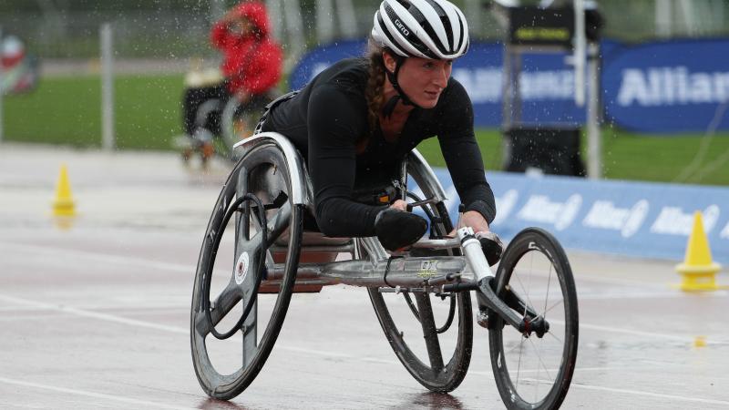Tatyana Mcfadden competes in torrential rain at the 2016 IPC Athletics Grand Prix in Nottwil, Switzerland.
