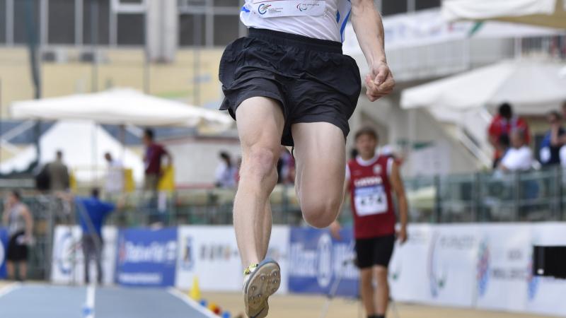 Man in the air during a lung jump