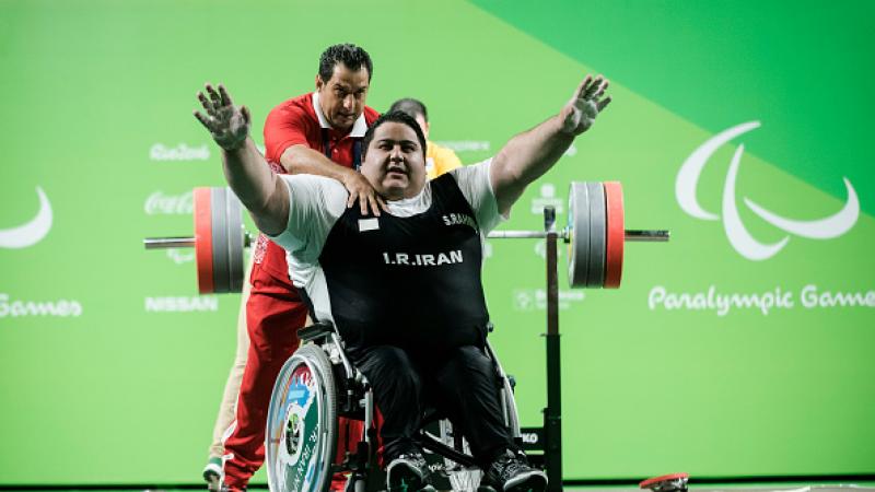 Siamand Rahman of Iran celebrates his new world record on the Powerlifting - Men's +107kg Group A at Riocentro Pavillon 2 at the Rio 2016 Paralympic Games.