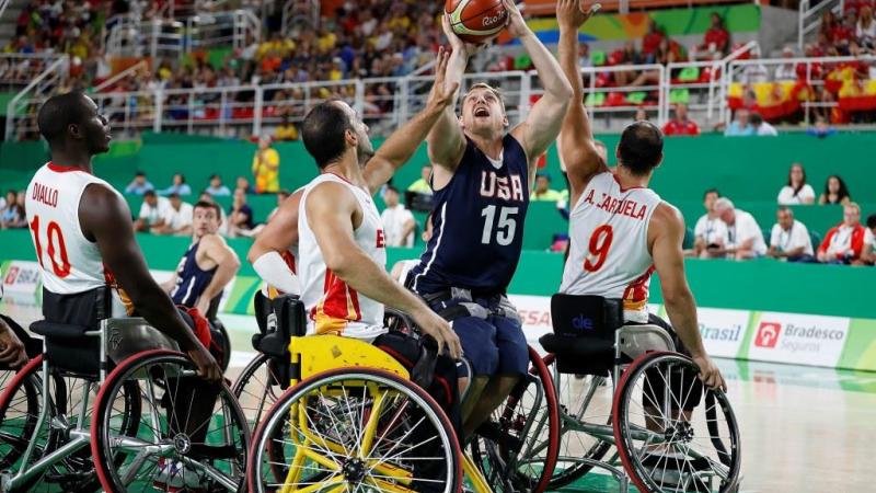 Athlete practicing wheelchair basketball.