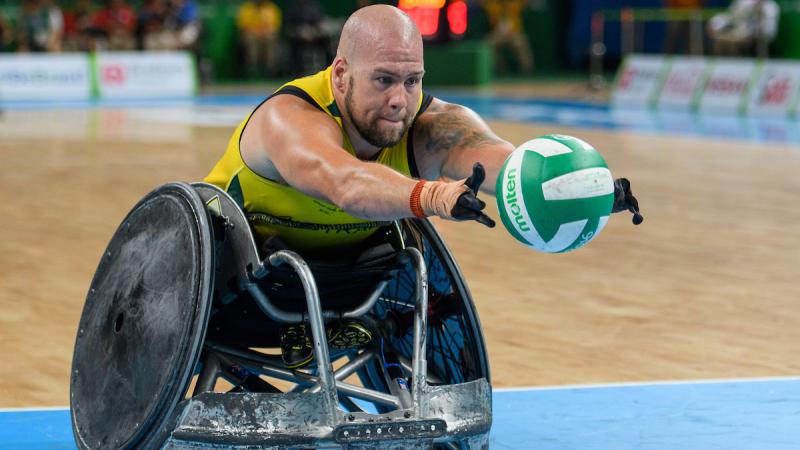 Ryley Batt AUS enters the scoring zone in the Gold Medal Match in the Mixed Wheelchair Rugby Between AUS and USA
