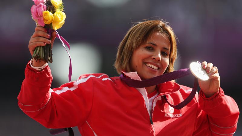 Tunisia's silver medallist Hania Aidi on the podium during the medal ceremony for the women's javelin F54/55/56 at the London 2012 Paralympic Games. 