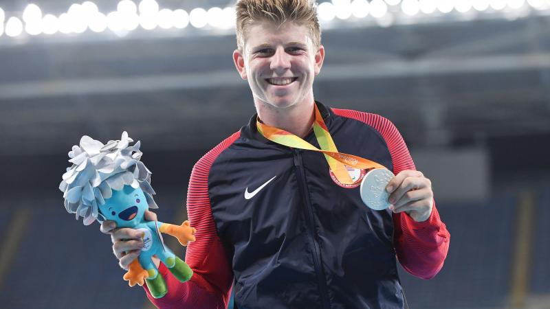 The USA's silver medallist Hunter Woodhall at the medal ceremony for the men's 200m T44 at the Rio 2016 Paralympic Games.